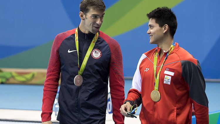 Zwei, die sich verstehen: Phelps und Schooling. Dekoriert mit Silber und Gold.