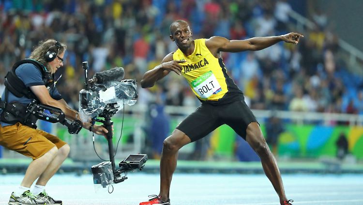 Weiß sich zu inszenieren: Superstar Usain Bolt nach seinem 200-Meter-Triumph.
