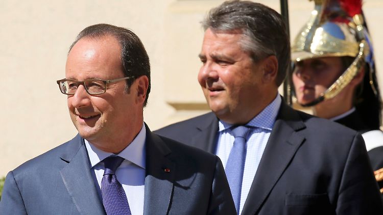 Der eine ist Präsident, der andere nur Minister - aber Hollande und Gabriel haben gemein, dass beide Sozialisten sind. 