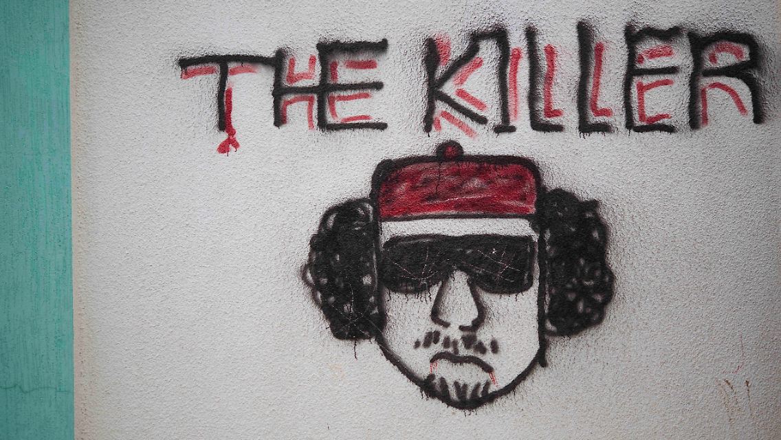 "Der Killer": Ein Gaddafi-Graffiti in Benghazi.