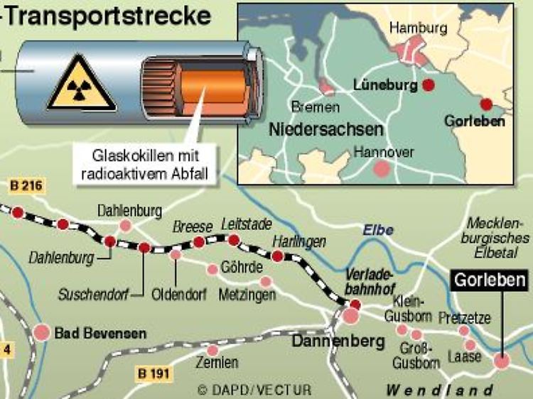 Castor-Transportstrecke: Detailkarte des Großraums Lüneburg/Gorleben mit Straßen, Bahnlinien, Bahnhöfen und Orten sowie Zeichnung eines Castorbehälters.