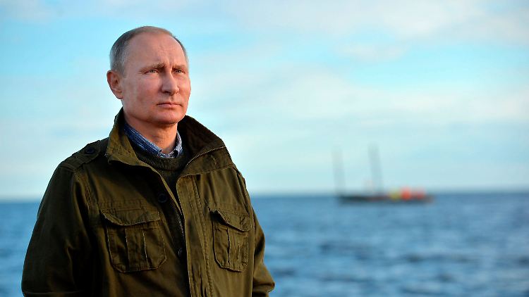 Putin im Bilde: Der einsame Herrscher, der über Russland wacht.