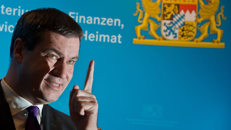 Markus Söder lobt die Kanzlerin, sieht ihre Worte aber auch kritisch.