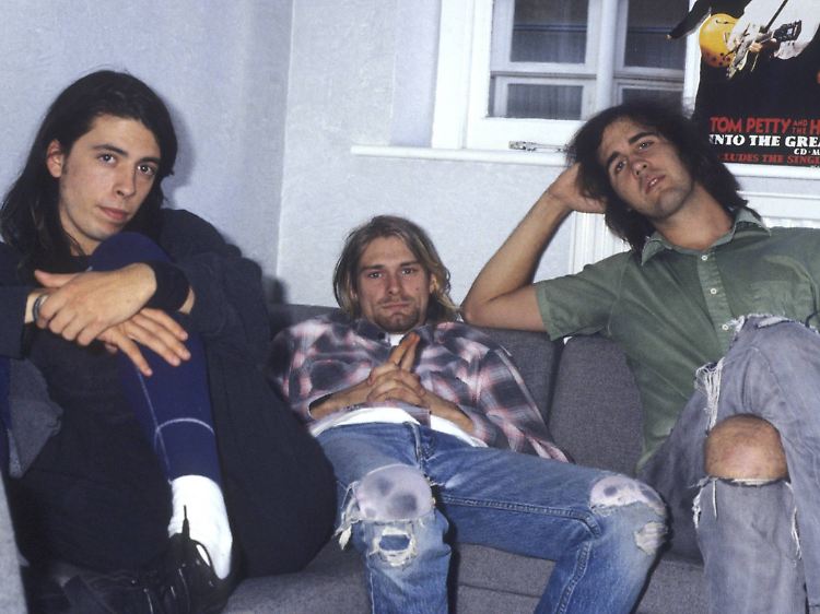 Dave Grohl, Kurt Cobain und Krist Novoselic am 20. August 1991 beim Interview zum Europa- Release des Albums.