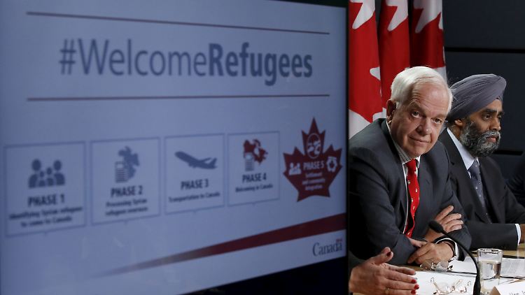 Betonte die positiven Auswirkungen von Einwanderung: Minister John McCallum (l.)