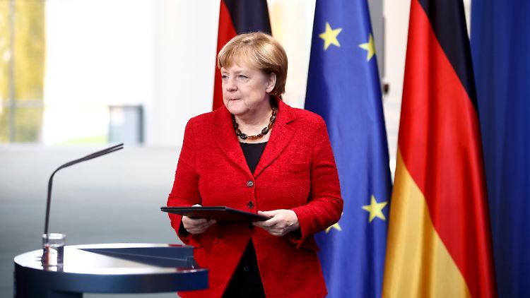 Thematisch passend erschien Merkel im roten Blazer zur Pressekonferenz.