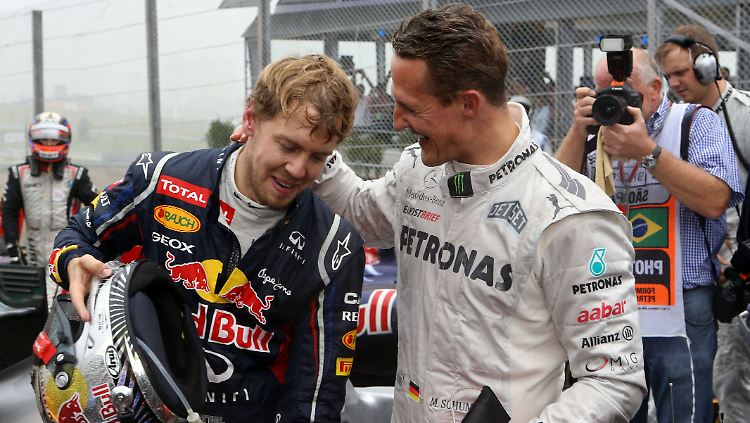 Ein Bild aus früheren Zeiten: Der junge Vettel mit Idol Michael Schumacher.