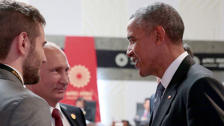 Standen nicht lange beieinander: Wladimir Putin (M.) und Barack Obama (r.)