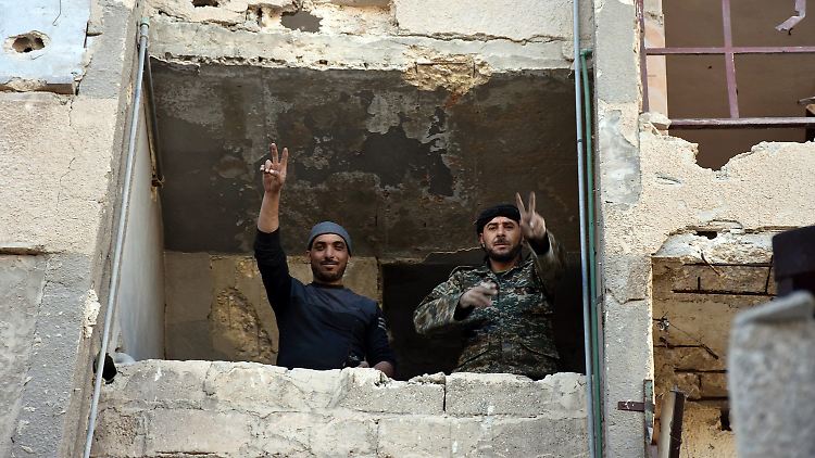 Assad-treue Soldaten in einem von den Rebellen zurückeroberten Viertel.