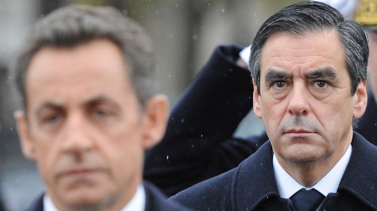 Fillon (r.) geht wohl nur kurz, Sarkozy will auch länger bleiben.