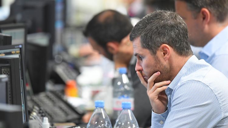Finanzmarktprofis bei der Arbeit: Wie wird sich der Trump-Faktor auf die deutsche Wirtschaft auswirken?