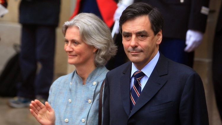 In schwerer Bedrängnis: François Fillon mit seiner Frau Penelope.