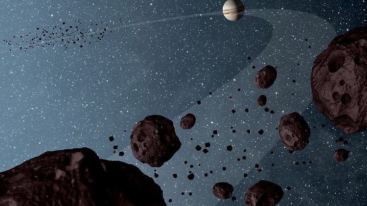 Diese Illustration zeigt die Trojanischen Asteroiden, die die Sonne auf der gleichen Bahn wie der Jupiter umkreisen. Der Geisterfahrer-Asteroid fliegt ihnen entgegen - ohne Kollision.