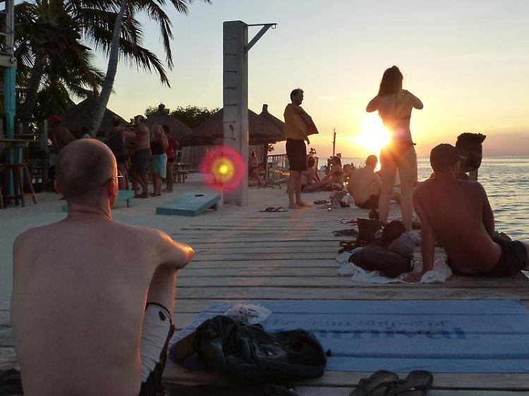 Sonnenuntergang an der Meerenge The Split: Caye Caulker überzeugt auf den zweiten Blick durch karibische Einfachheit.