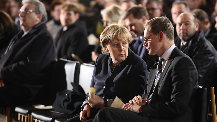 Angela Merkel und Berlins Regierender Bürgermeister Michael Müller bei der Trauerfeier für die Opfer des Berliner Terroranschlags. In den Augen der Kanzlerin muss die Hauptstadt ihre Sicherheitsgesetze verschärfen. 