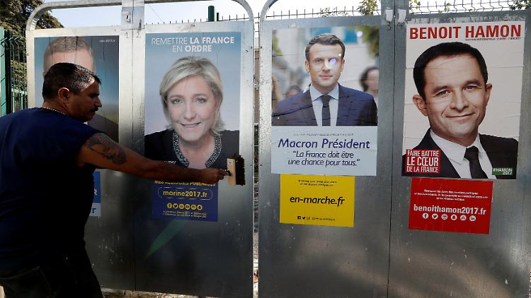 Das Rennen um die französische Präsidentenschaft wird enger, doch Emmanuel Macron (m.) gehört den Umfragen zufolge nach wie vor zu den Favoriten auf die zweite Runde.
