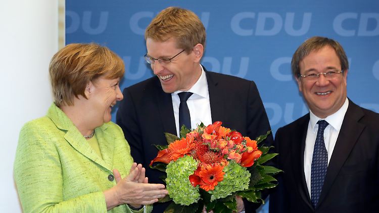 Daniel Günther (M.) war bereits erfolgreich, Angela Merkel und Armin Laschet haben ihre Wahlen noch vor sich.