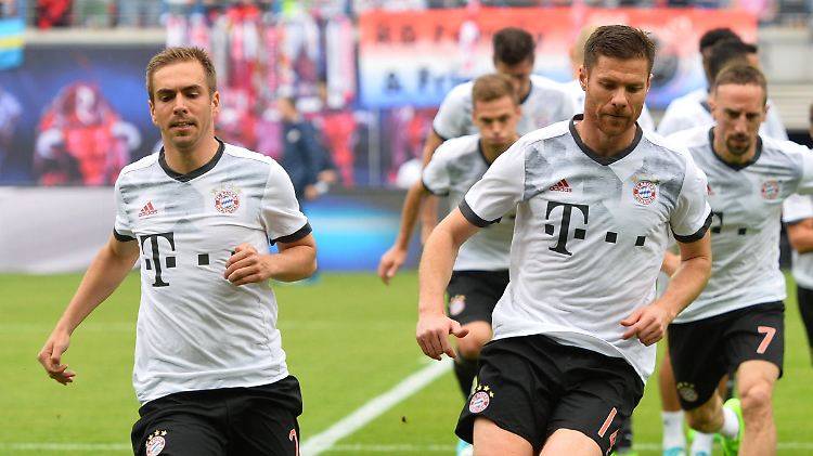 Sprint auf die Zielgerade: Philipp Lahm und Xabi Alonso werden am Samstag ihre Karrieren beenden.