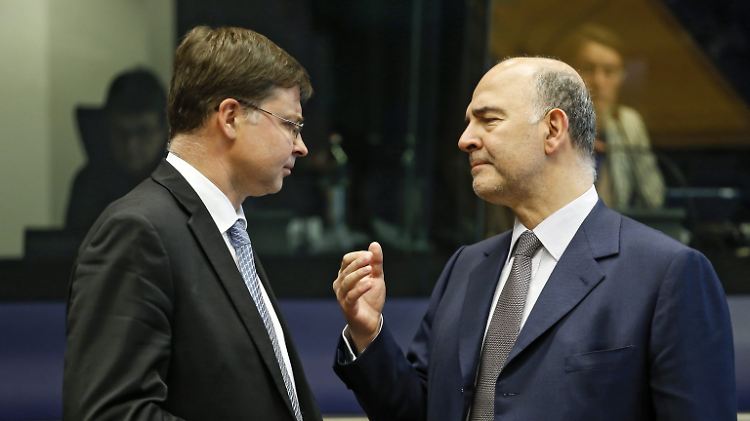 Die beiden EU-Kommissare Dombrovskis (l.) und Moscovici (r.) im Gespräch über die Zukunft der Europäischen Union.