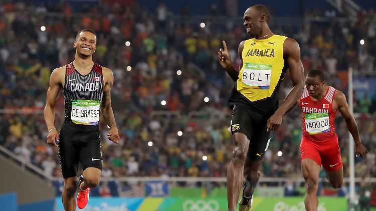 André de Grasse (l.) kann Usain Bolt den Titel in London schon mal nicht streitig machen. 