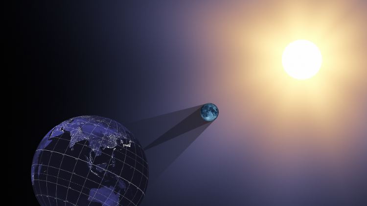Der Schatten des Mondes wandert bei einer totalen Sonnenfinsternis über die Erde.