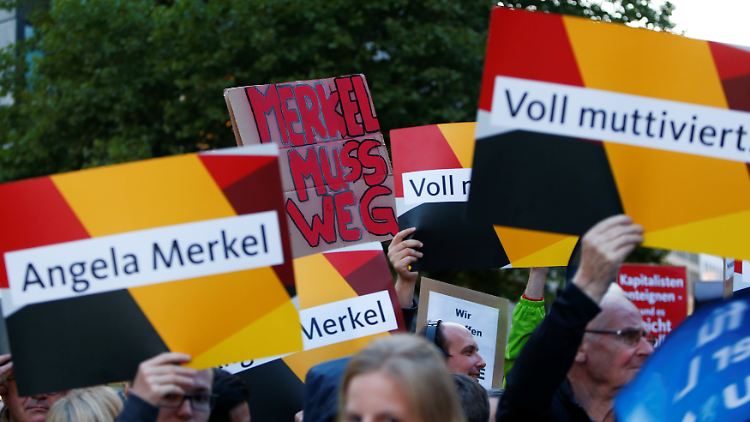 Nicht alle Anwesenden in München waren Anhänger von Bundeskanzlerin Merkel.