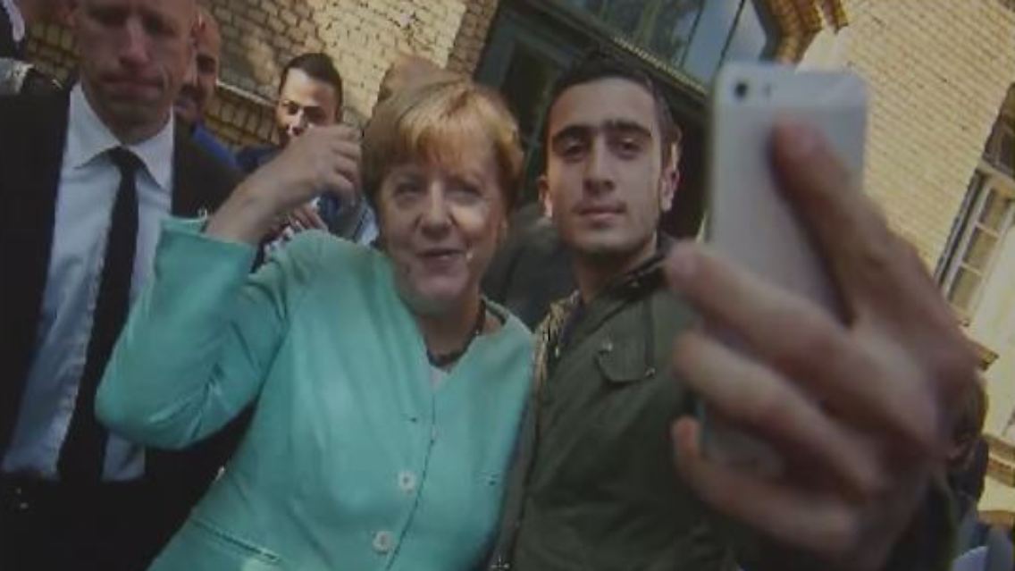 merkel fake news selfie.JPG