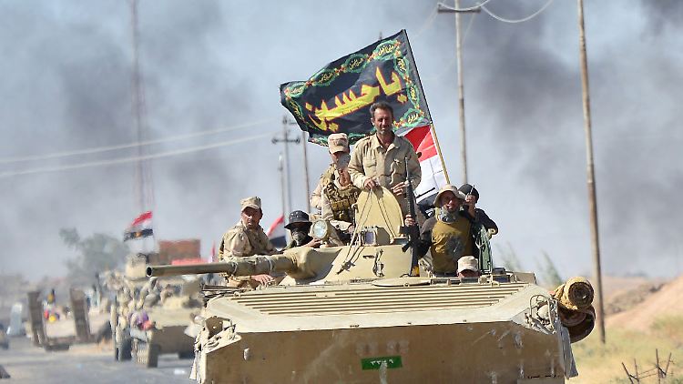 Irakische Truppen nehmen Al-Hawidscha ein.
