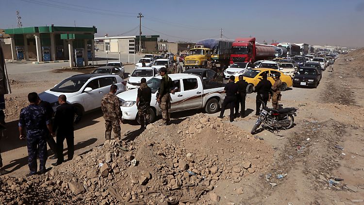 Einwohner, die vor den Kämpfen geflohen waren, kehren nach Kirkuk zurück.