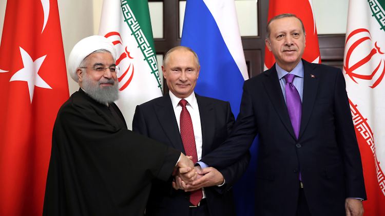 Präsidenten unter sich - Ruhani, Putin und Erdogan (v.l.)