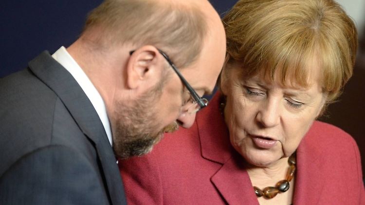 Schulz und Merkel im Bundestag.