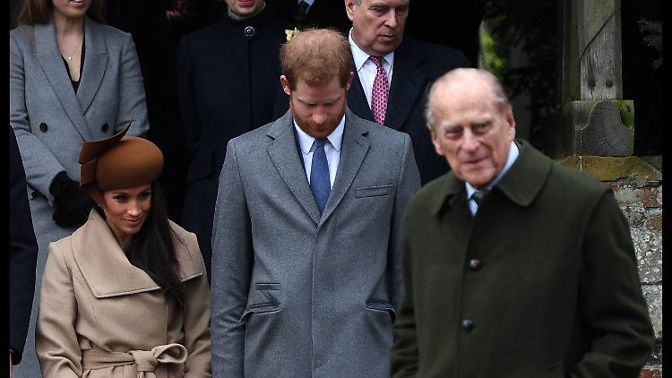Die Familie, die sie nie hatte? Meghan Markle mit Prinz Harry und dem Mann der Queen, Prinz Philip.