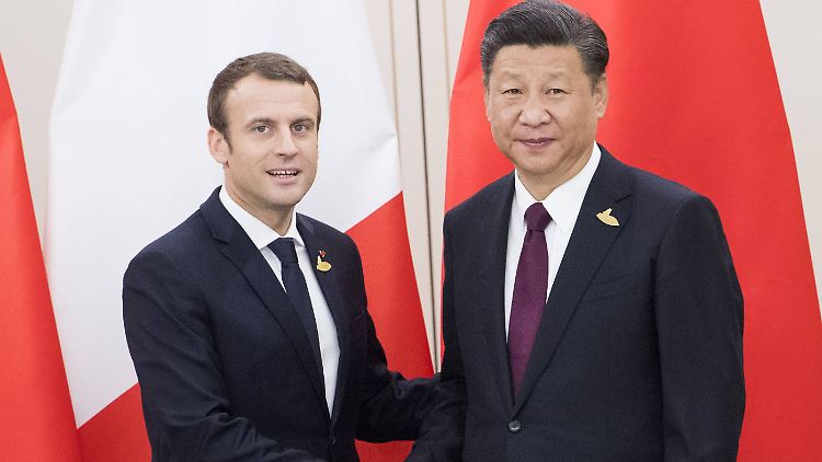 Emmanuel Macron besucht zum ersten Mal als französischer Staatschef seinen chinesischen Amtskollegen Xi Jinping.