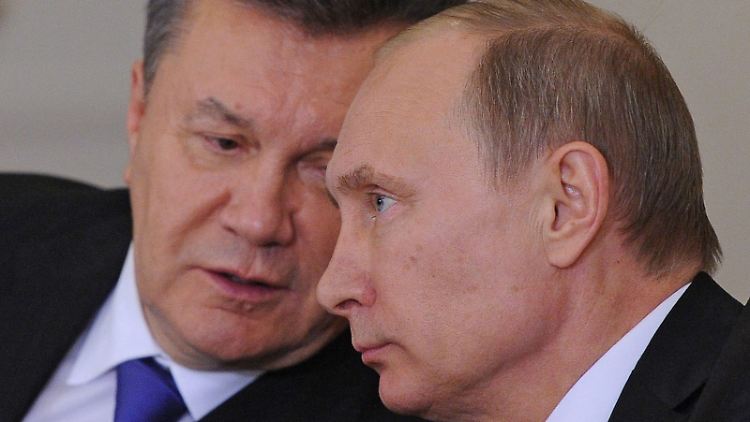 Über Umwege: Die Deutsche soll Geschäftsführerin einer angeblichen Lobby-Organisation des früheren ukrainischen Präsidenten Viktor Janukowitsch (l) gewesen sein.