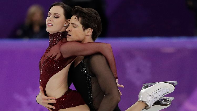 Zu "Moulin Rouge" bringen Virtue und Moir französisches Flair auf die Eisfläche.