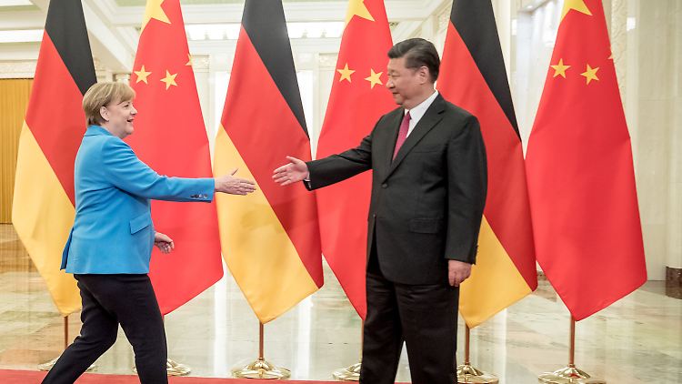 Trotz aller Meinungsverschiedenheiten wollen Angela Merkel und i ihre Kooperation stärken.