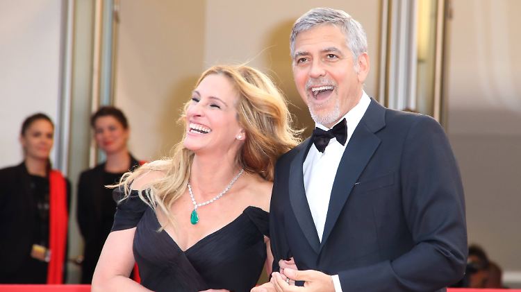 Auf der Leinwand ein Paar, im echten Leben gute Freunde. Julia Roberts und George Clooney.