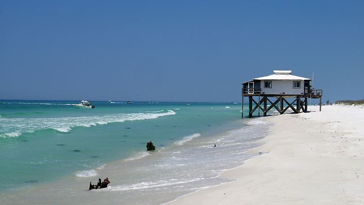 Shell Island: Auf der einen Seite Party, auf der anderen einsamer Sandstrand und Meeresrauschen.