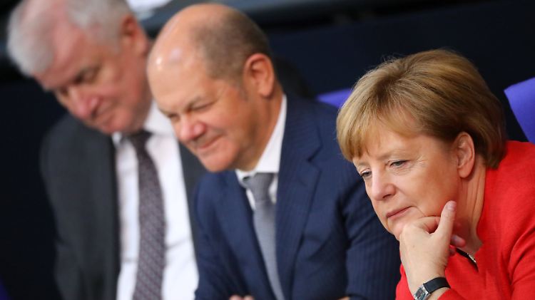 Angela Merkel, Olaf Scholz und Horst Seehofer sind sich offenbar einig.