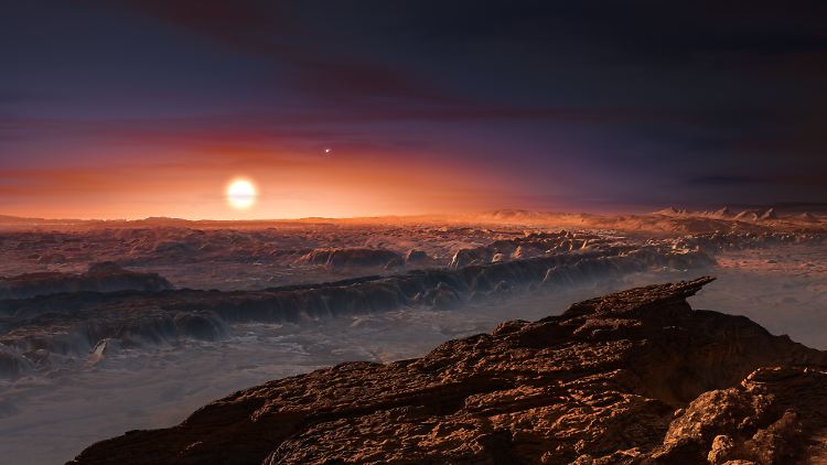 Die Computergrafik zeigt die Oberfläche des Planeten Proxima b, der den roten Zwergstern Proxima Centauri, den dem Sonnensystem am nächsten liegenden Stern, umkreist. 