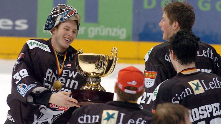 Wild (l.) 2004 nach dem Pokalsieg mit Köln.