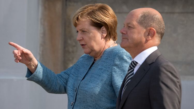 Angela Merkel und Olaf Scholz wollen internationale IT-Konzerne an deutsche Regeln erinnern.