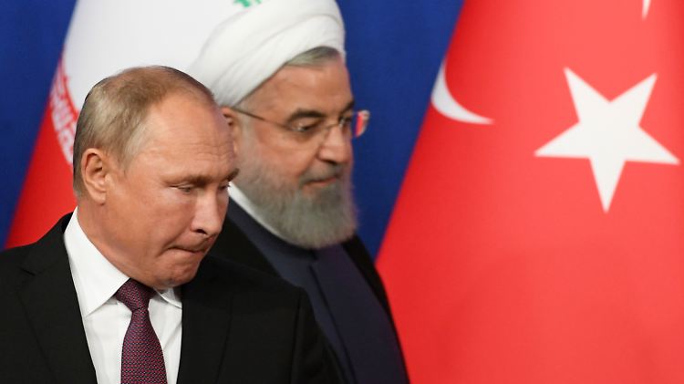 Präsident Putin und Hassan Ruhani diskutieren beim Dreiergipfel in Teheran die Situation in Idlib.