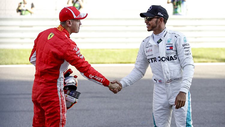 Gehen fair miteinander um: Sebastian Vettel (l.) und Lewis Hamilton.