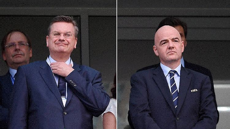 Reinhard Grindel und Gianni Infantino haben ein distanziertes Verhältnis zueinander.