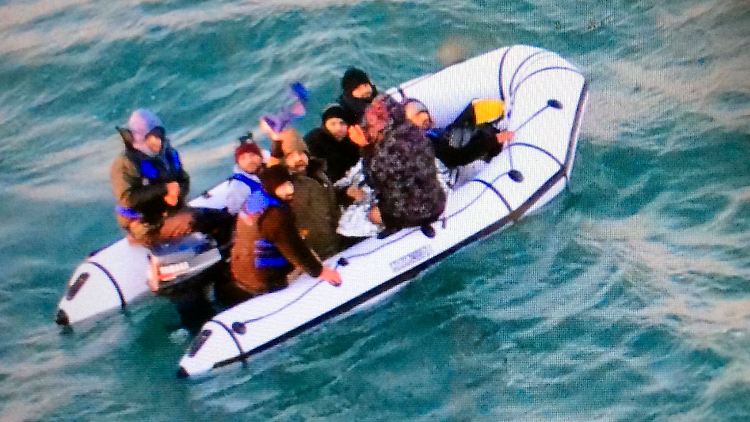 Flüchtlinge auf den Weg in Richtung Großbritannien.