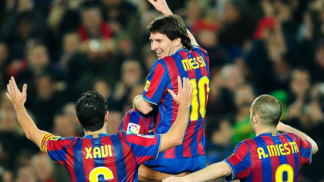 Da freuen sie sich: Lionel Messi, Andres Iniesta und Xavi.