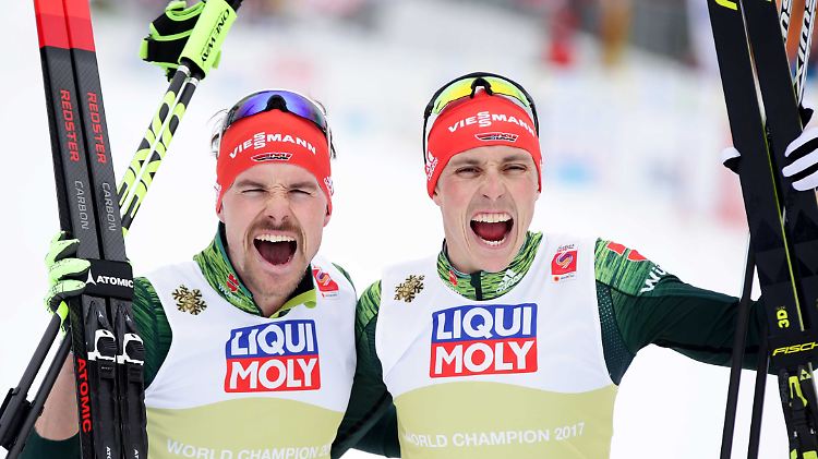 Erfolgreich kombiniert: Fabian Rießle (l.) und Eric Frenzel gewinnen WM-Gold im Teamsprint.