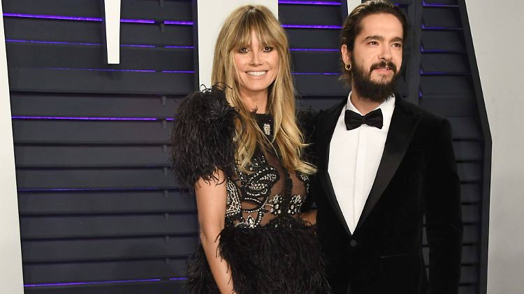Heidi Klum mit Pony und Verlobtem auf dem roten Teppich. Doch wie soll man bei dem Kleid irgendwas erkennen?