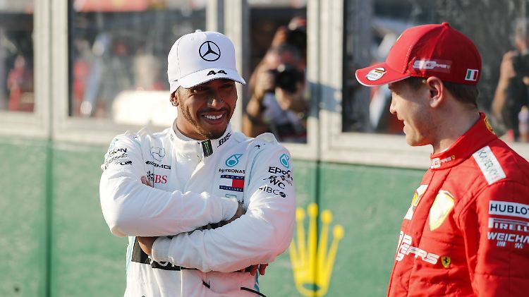 Weltmeister Lewis Hamilton darf sich mal wieder freuen, Sebastian Vettel ist enttäuscht.